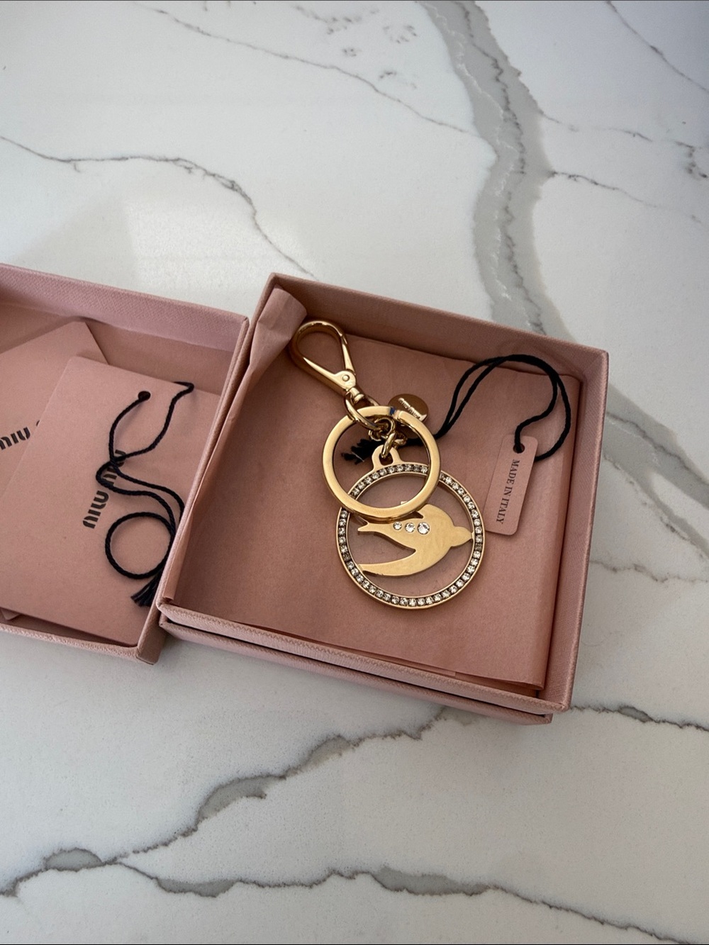 Miu Miu Gold Bird with Crystals Bag Charm Key Holder Sticker On Still